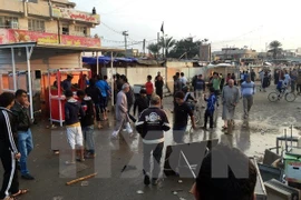 Hiện trường một vụ đánh bom ở Iraq. (Nguồn: THX/TTXVN)