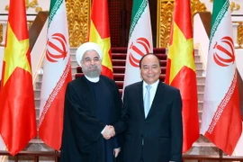 Thủ tướng Nguyễn Xuân Phúc hội kiến với Tổng thống Iran Hassan Rouhani. (Ảnh: Thống Nhất/TTXVN) 