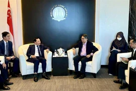 Quang cảnh buổi làm việc. (Ảnh: Tất Đạt/TTXVN)