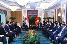 Thủ tướng Phạm Minh Chính tiếp ông Teo Chee Hean, Bộ trưởng cao cấp Singapore phụ trách điều phối về An ninh và phụ trách điều phối về quan hệ với Việt Nam đến chào xã giao. (Ảnh: Dương Giang/TTXVN)
