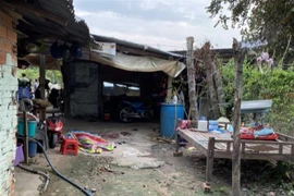 Hiện trường vụ án tại khu phố Lộc Vĩnh, phường Lộc Hưng, thị xã Trảng Bàng, Tây Ninh. (Ảnh: TTXVN phát)