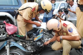 Công an Thành phố Hồ Chí Minh làm nhiều vụ. (Ảnh: Mạnh Linh/TTXVN)