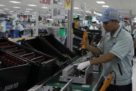 Sản xuất hàng điện tử xuất khẩu. (Ảnh: Vũ Sinh/TTXVN)