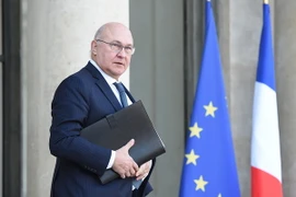 Bộ trưởng Tài chính Pháp Michel Sapin sau cuộc họp Hội đồng Bộ trưởng Pháp ở thủ đô Paris ngày 20/1. (Nguồn: AFP/TTXVN)
