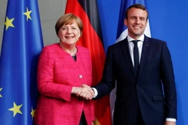 Thủ tướng Đức Angela Merkel và Tổng thống Pháp Emmanuel Macron. (Nguồn: Reuters) 