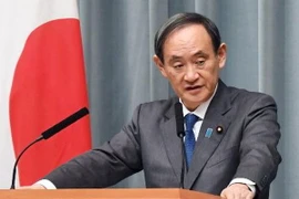Chánh văn phòng nội các Nhật Bản Yoshihide Suga tại một cuộc họp báo ở Tokyo. (Nguồn: Kyodo/TTXVN)