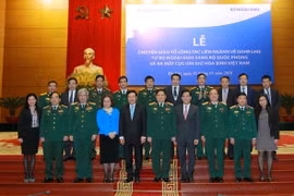Các đại biểu chụp ảnh lưu niệm. (Ảnh: An Đăng/TTXVN)