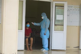 Chốt kiểm soát tại khu cách ly tập trung, huyện Mường Lát, Thanh Hóa. (Ảnh: Nguyễn Nam/TTXVN)