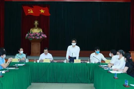 Phó Thủ tướng Vũ Đức Đam thông tin chuyên đề với lãnh đạo các cơ quan báo chí về tình hình phòng, chống dịch bệnh trong gia đoạn hiện nay. (Ảnh: Phương Hoa/TTXVN)