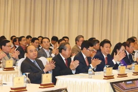 Thủ tướng Nguyễn Xuân Phúc và các đại biểu dự hội nghị. (Ảnh:Thống Nhất/TTXVN)