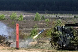 Xe tăng quân sự tham gia cuộc tập trận ở Pabrade, Litva. (Nguồn: THX/TTXVN)