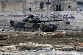 Xe quân sự Syria tại thị trấn al-Bab. (Nguồn: AP/TTXVN)