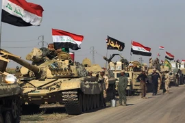 Các lực lượng Iraq tiến vào ngoại ô phía nam thành phố Kirkik. (Nguồn: AFP/TTXVN)