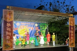 Một tiết mục biểu diễn trong lễ hội. (Nguồn: Vietnam+)