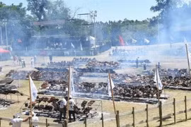 Quang cảnh bữa tiệc thịt nướng. (Nguồn: AFP)