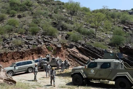 Lực lượng an ninh gác tại khu vực al-Khubah, tỉnh Jizan trên biên giới Saudi Arabia-Yemen ngày 3/10. (Nguồn: AFP/TTXVN)