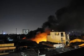 Hiện trường vụ cháy nhìn từ trên cao. (Ảnh: Mạnh Linh/TTXVN)