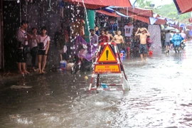 Hình ảnh ngập úng ở thành phố Hà Nội. (Ảnh: PV/Vietnam+)