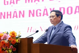 Thủ tướng Phạm Minh Chính phát biểu tại buổi gặp mặt đại diện doanh nghiệp nhân Ngày Doanh nhân Việt Nam (13/10). (Ảnh: Dương Giang/TTXVN)