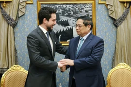 Thủ tướng Phạm Minh Chính gặp Hoàng Thái tử Jordan Al Hussein Bin Abdullah II. (Ảnh: Dương Giang/TTXVN)