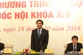 Tổng thư ký Quốc hội, Chủ nhiệm Văn phòng Quốc hội Nguyễn Hạnh Phúc trả lời câu hỏi của phóng viên trong nước và quốc tế. (Ảnh: Phương Hoa/TTXVN)