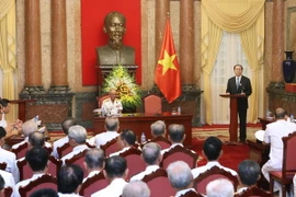 Chủ tịch nước Trần Đại Quang phát biểu tại buổi gặp mặt. (Ảnh: Nhan Sáng/TTXVN)