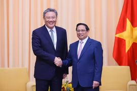 Thủ tướng Phạm Minh Chính tiếp Bộ trưởng Thương mại Trung Quốc Vương Văn Đào. (Ảnh: Dương Giang/TTXVN)