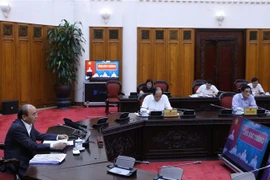 Thủ tướng Nguyễn Xuân Phúc chủ trì buổi làm việc trực tuyến. (Ảnh: Thống Nhất/TTXVN)