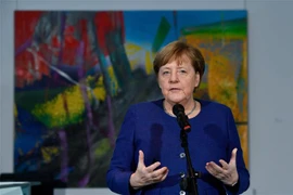 Thủ tướng Đức Angela Merkel phát biểu tại cuộc họp về ảnh hưởng của dịch COVID-19 tới kinh tế và xã hội ở Berlin, ngày 13/3. (Ảnh: AFP/TTXVN)