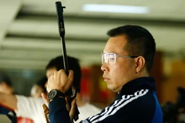 Hoàng Xuân Vinh thảm bại ở Cúp thế giới vì đang trong giai đoạn thay đổi kỹ thuật. (Ảnh: Minh Chiến/Vietnam+)