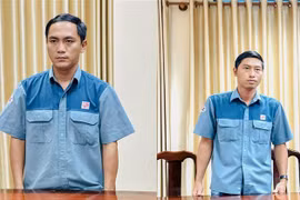 Hai bị can Phạm Minh Nhựt (bên phải) và Huỳnh Hoàng Tâm. (Ảnh: TTXVN phát)