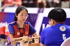 Kỳ thủ Phương Thảo thi đấu xuất sắc, giúp đội Việt Nam giành Huy chương Vàng nội dung đồng đội nữ 60 phút. (Ảnh: Minh Quyết/TTXVN)