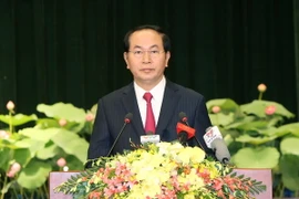 Chủ tịch nước Trần Đại Quang đến dự và phát biểu tại Lễ kỷ niệm 40 năm thành phố Sài Gòn-Gia Định vinh dự mang tên Chủ tịch Hồ Chí Minh. (Ảnh: Nhan Sáng/TTXVN)