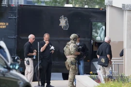 Cảnh sát Michigan điều tra tại hiện trường vụ xả súng. (Nguồn: AFP/TTXVN)