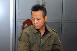Đối tượng Nguyễn Văn Kỳ tại trụ sở công an . (Ảnh: Doãn Tấn/TTXVN)
