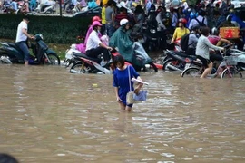 Hà Nội ngập thành sông sau trận mưa lớn hồi tháng 5. (Ảnh: PV/Vietnam+)