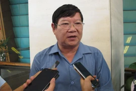 Đại biểu Quốc hội Lê Như Tiến (đoàn Quảng Trị) đang trao đổi với báo chí. (Ảnh: Đức Duy/Vietnam+)