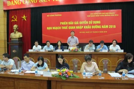 Phiên đấu giá quyền sử dụng hạn ngạch thuế quan nhập khẩu đường năm 2016. (Ảnh: Đức Duy/Vietnam+)