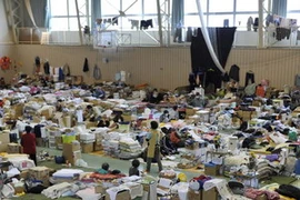 Người dân bị mất nhà ở do động đất và sóng thần sống trong khu nhà tạm tại Yamada, quận Iwate. (AFP/TTXVN)