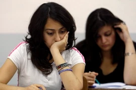 Học sinh làm bài thi ở Nga. (Nguồn: ruvr.ru)