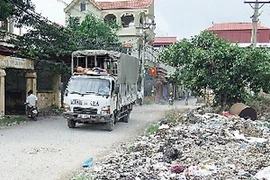 Tình trạng ô nhiễm tại làng nghề giấy Phong Khê. (Nguồn: Internet)