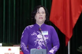 Bộ trưởng Bộ Lao động, Thương binh và Xã hội Phạm Thị Hải Chuyền trả lời chất vấn. (Ảnh: Nhan Sáng/TTXVN)