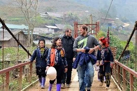 Du khách quốc tế thăm Sa Pa. (Ảnh: Thanh Hà/TTXVN)