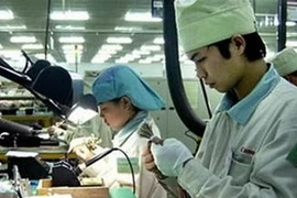 Một dây chuyền sản xuất của hãng điện tử Canon tại Khu công nghiệp Thăng Long. 