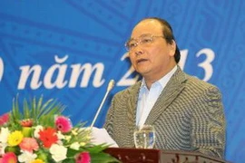 Phó Thủ tướng Nguyễn Xuân Phúc phát biểu tại hội nghị. (Ảnh: Doãn Tấn/TTXVN)