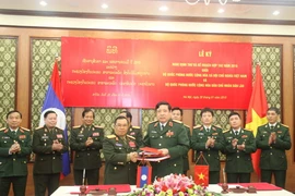 Bộ Quốc phòng Việt-Lào ký Nghị định thư và Kế hoạch hợp tác 2015