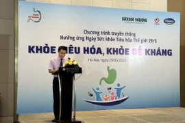 Phó giáo sư Trần Thanh Dương - Viện trưởng Viện Dinh dưỡng Quốc gia phát biểu tại buổi lễ. (Ảnh: PV/Vietnam+)