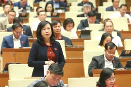 Bộ trưởng Bộ Y tế Đào Hồng Lan giải trình, làm rõ vấn đề đại biểu Quốc hội nêu. (Ảnh: Phương Hoa/TTXVN)