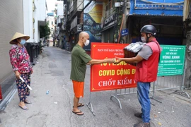 Hà Nội nhân rộng, mở rộng "Vùng xanh" trong phòng, chống dịch COVID-19. (Ảnh: Hoàng Hiếu/TTXVN)