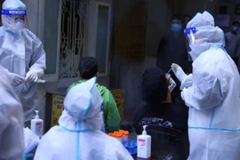 Ngày 5/2, Hà Nội ghi nhận 634 ca mắc COVID-19 trong cộng đồng. (Ảnh: TTXVN/Vietnam+)